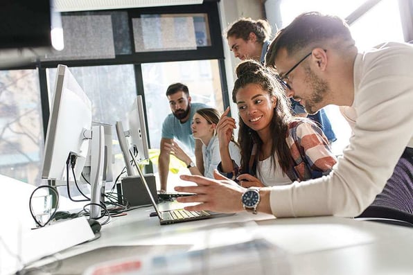 employees working together in office space